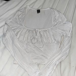 Cute white long sleeved crop top.